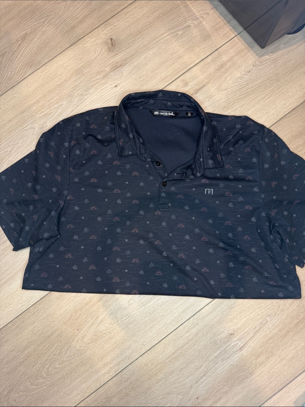 Travis Mathew Black Polo with Sunset Motif